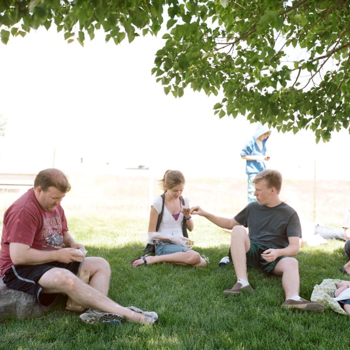 Sitting in the grass in Beaver, Utah